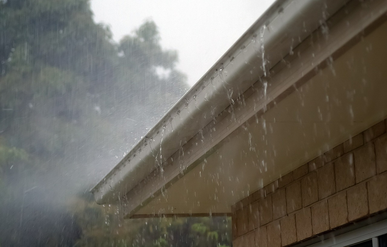 House gutters in the pouring rain